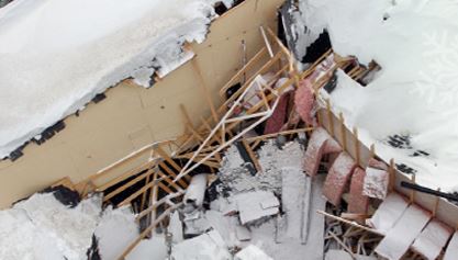 Collapsed roof from heavy snow - Boynton & Boynton Insurance